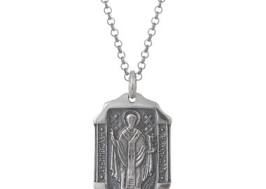 Ασημένιο μενταγιόν με φλουρί με δύο όψεις σε πολυγωνικό σχήμα με απεικονιζόμενο τον Άγιο Νικόλαο -  - 