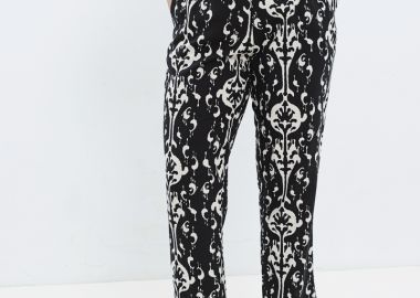 Εμπριμέ παντελόνι σε μαύρο χρώμα -  - 