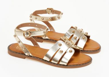 Φλατ σανδάλια με μεταλλικές λεπτομέρειες - Χρυσό - Issue - 