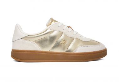 Tommy Jeans γυναικεία sneakers με μεταλλικό μονόγραμμα και γυαλιστερή όψη - FW0FW09026 Χρυσό - TOMMY JEANS - 